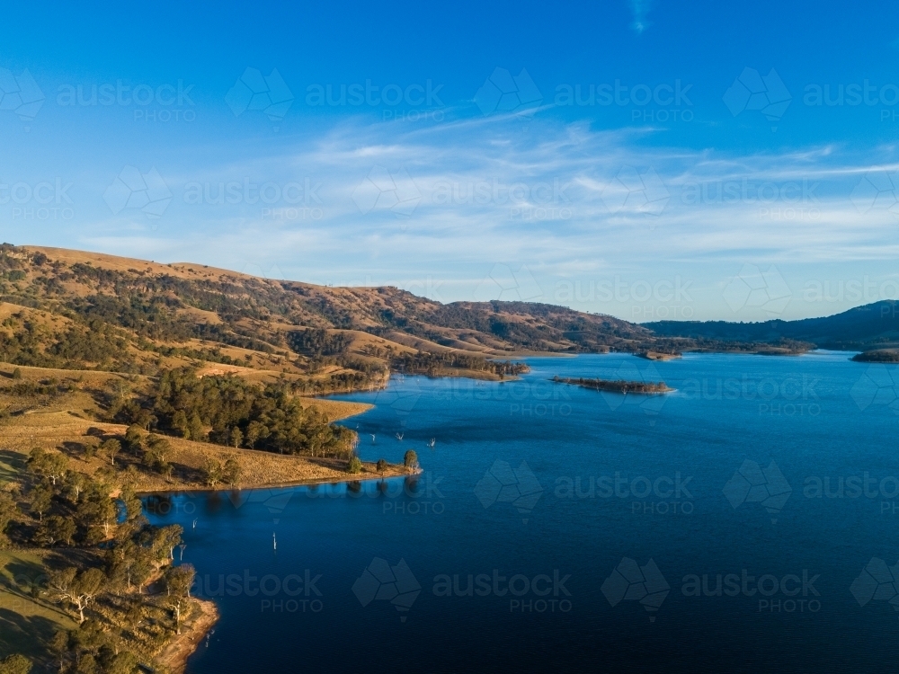 Drone view of water and shoreline of Lake St Clair in Hunter Valley, NSW, Australia - Australian Stock Image