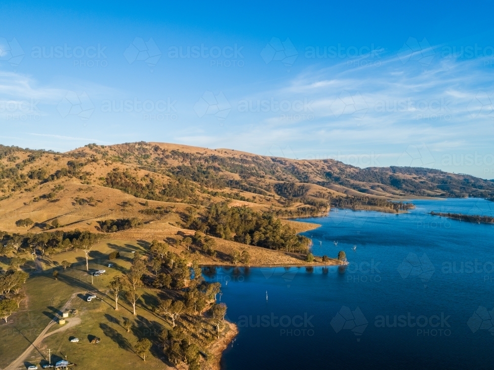 Drone view of water and shoreline of Lake St Clair in Hunter Valley, NSW, Australia - Australian Stock Image