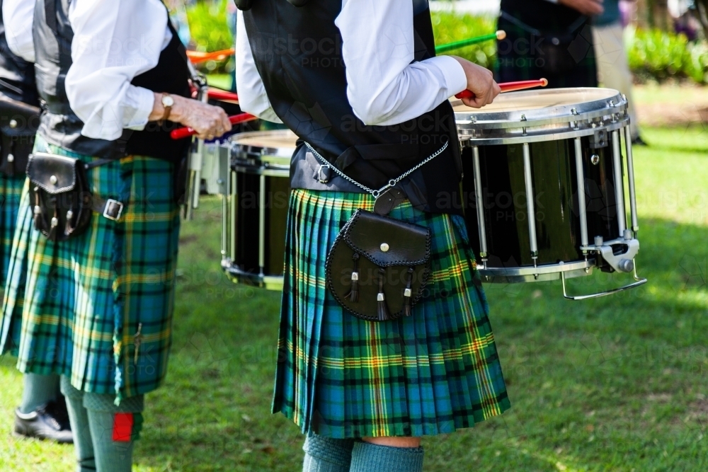 Drummers in band wearing kilts - Australian Stock Image