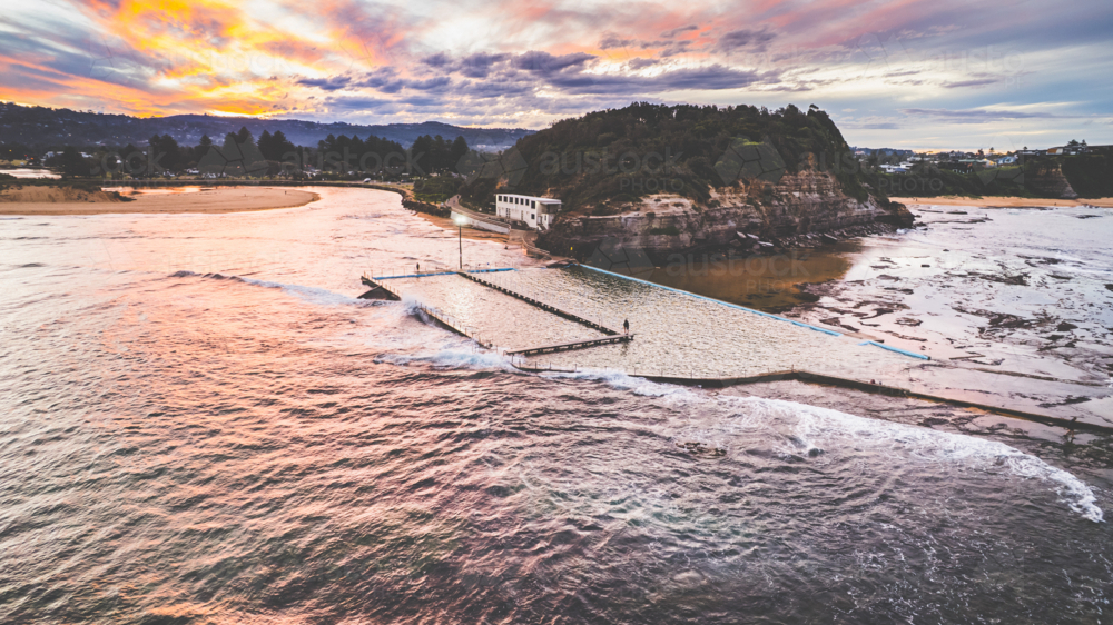 Dusk over North narrabeen rockpool and Narrabeen Head - Australian Stock Image