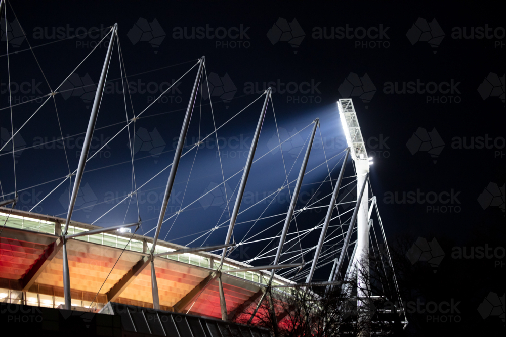 Dusk view of Melbourne's famous skyline and Melbourne Cricket Ground stadium in Melbourne, Victoria - Australian Stock Image