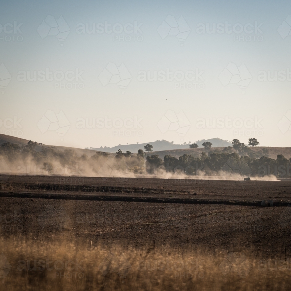 dust created by the farmer working the land - Australian Stock Image