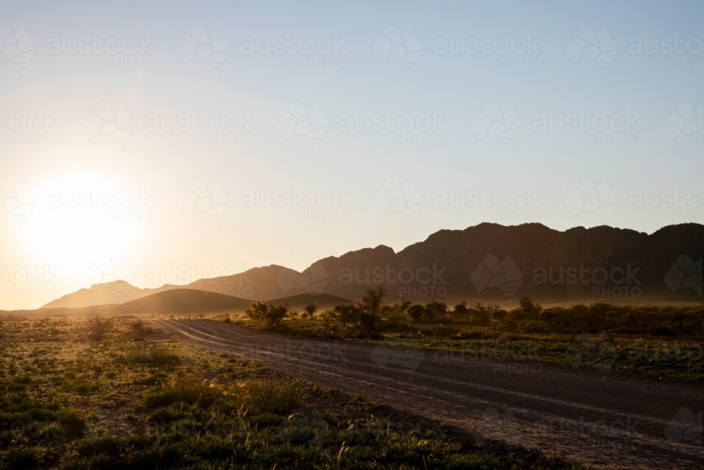 dust lined hills in early morning light - Australian Stock Image