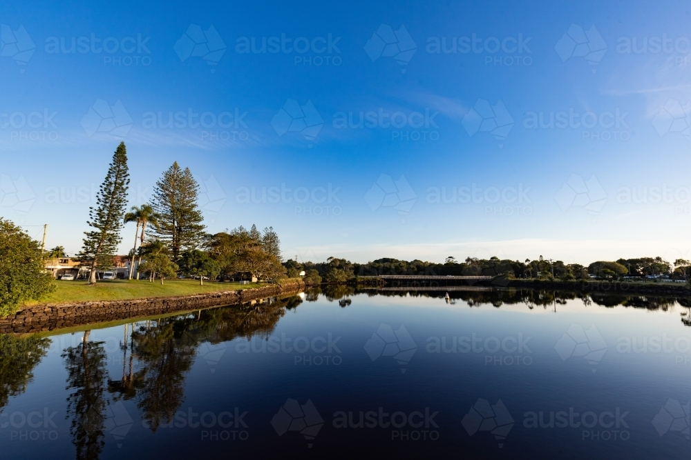 Early morning at Brunswick Heads with view of bridge across water : Austockphoto Early morning at Brunswick Heads with view of bridge across water - Australian Stock Image