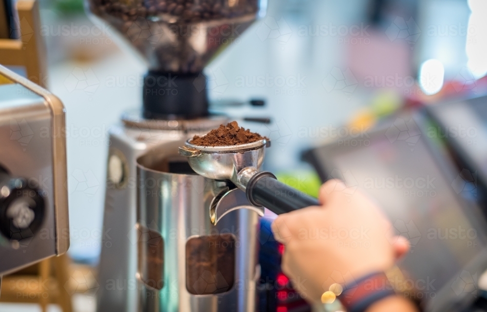 Early morning coffee grinding - Australian Stock Image
