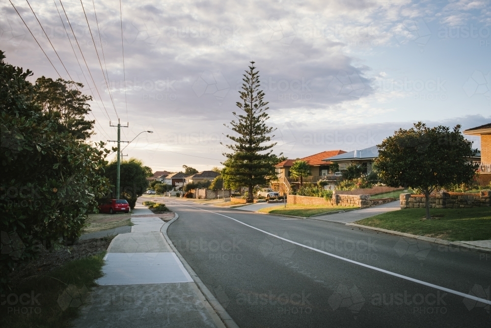 Early morning light along a street in suburban Perth WA - Australian Stock Image