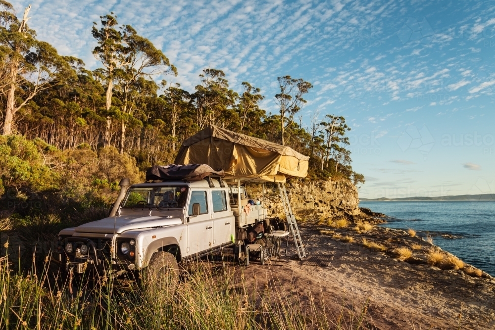 early morning light on a remote campsite - Australian Stock Image