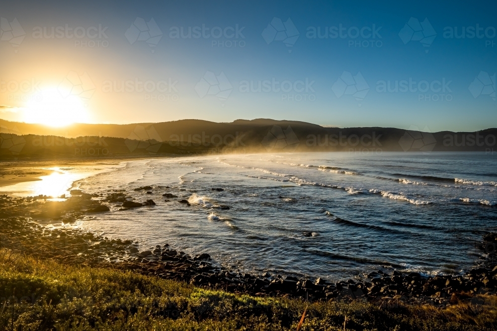 Early morning misty beach scene - Australian Stock Image