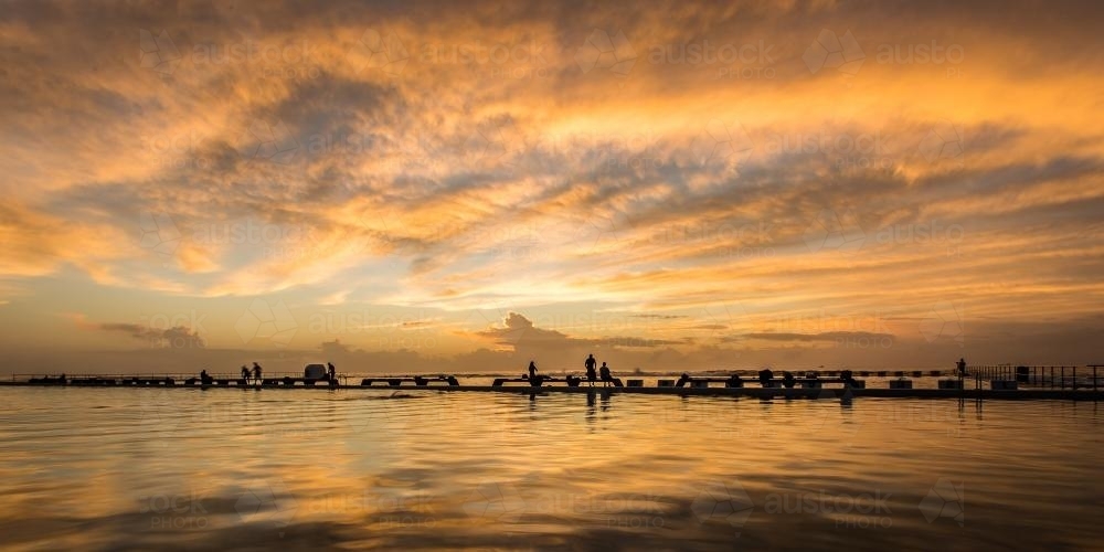 early morning swim in the ocean baths - Australian Stock Image