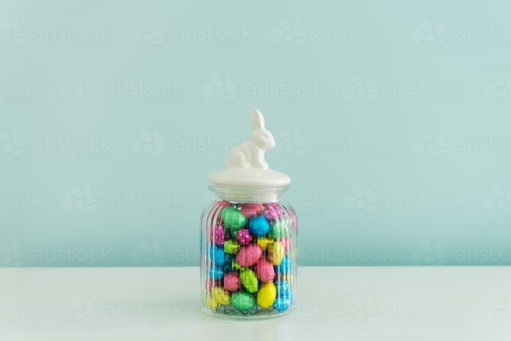 easter eggs in glass jar - Australian Stock Image