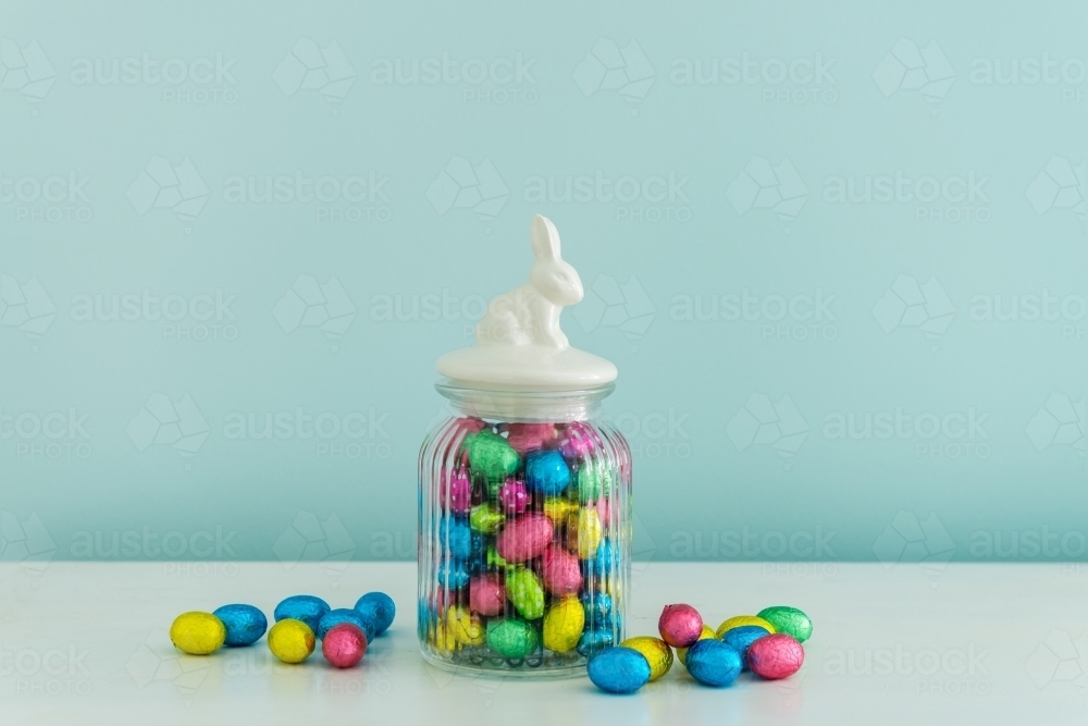 easter eggs in glass jar - Australian Stock Image