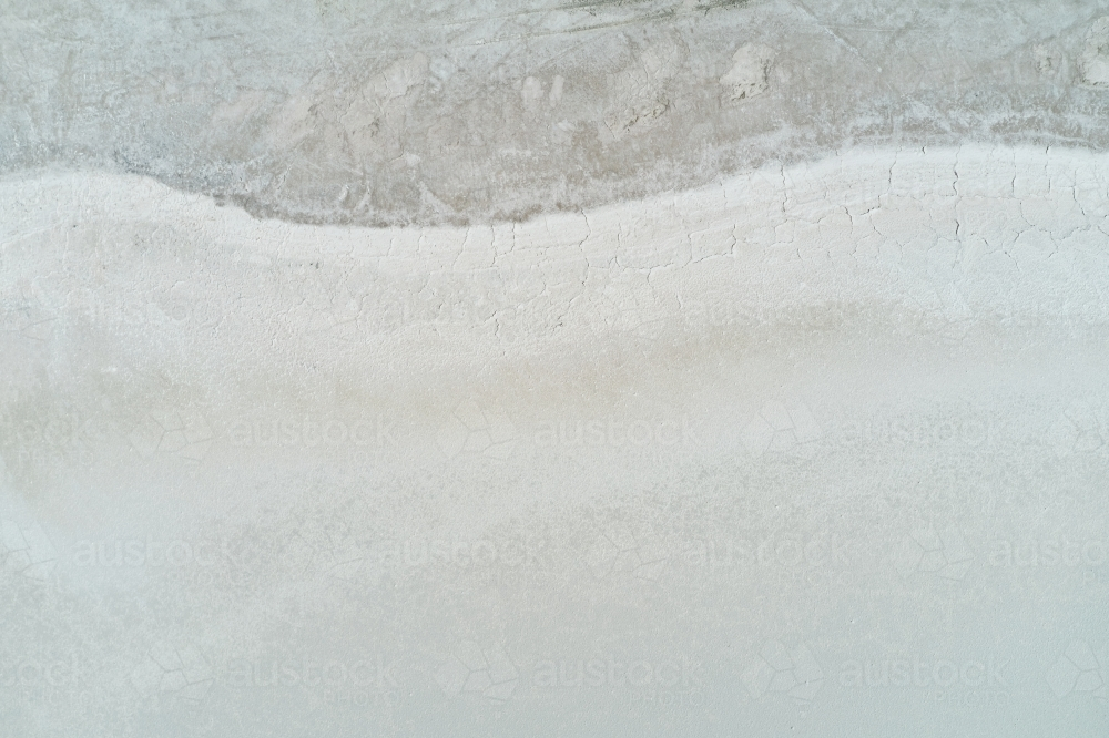 Edge pattern and texture of the surface on a dry salt lake in Western Australia. - Australian Stock Image