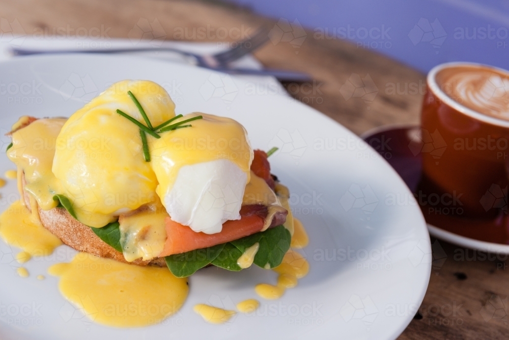 Image of eggs benedict with smoked salmon on sourdough Austockphoto