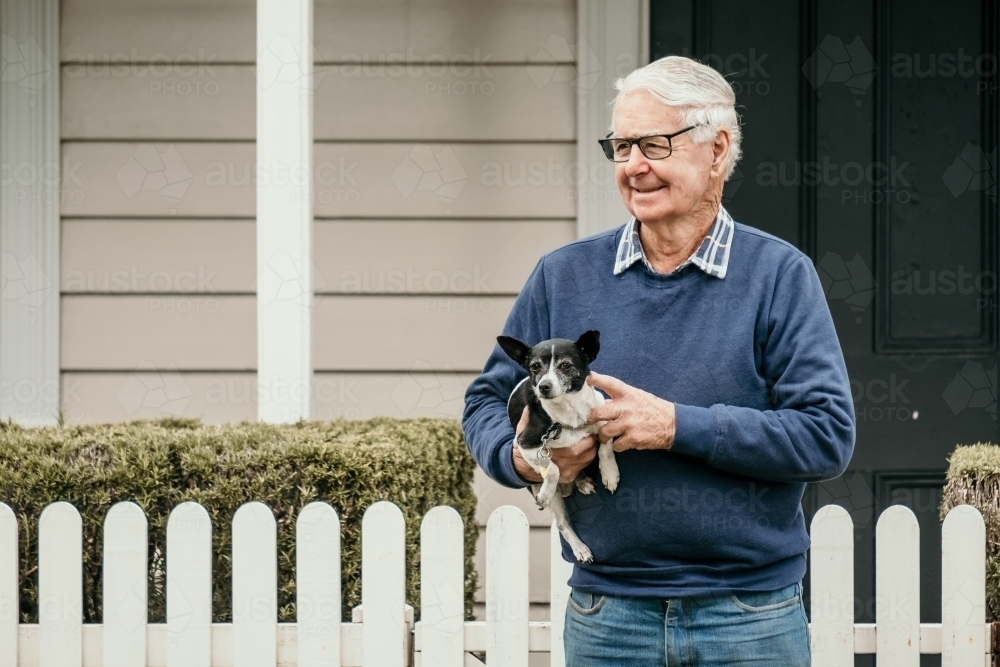 Elderly man with his dog - Australian Stock Image