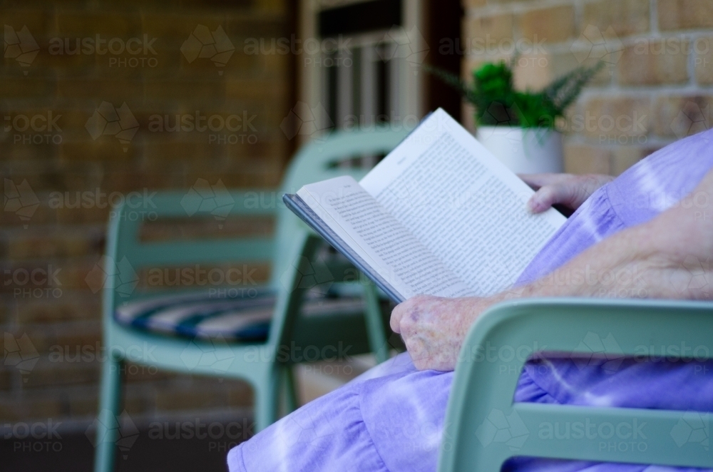 Elderly Women Reading a Book - Australian Stock Image