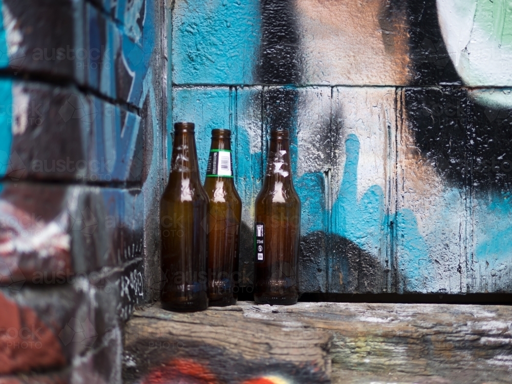 Empty Beer Bottles in a Laneway - Australian Stock Image
