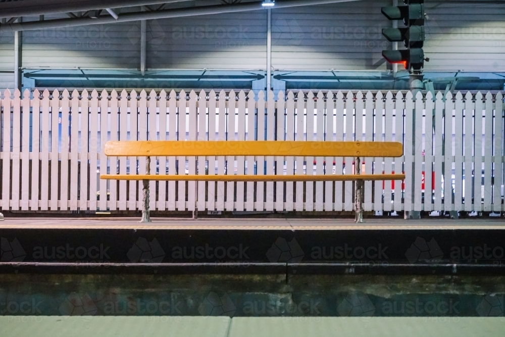 Empty bench at train station - Australian Stock Image