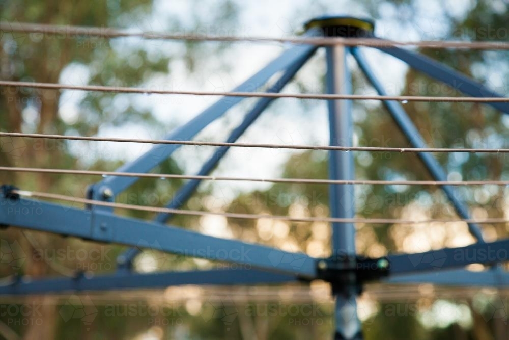 Empty clothesline at sunset after the rain - Australian Stock Image