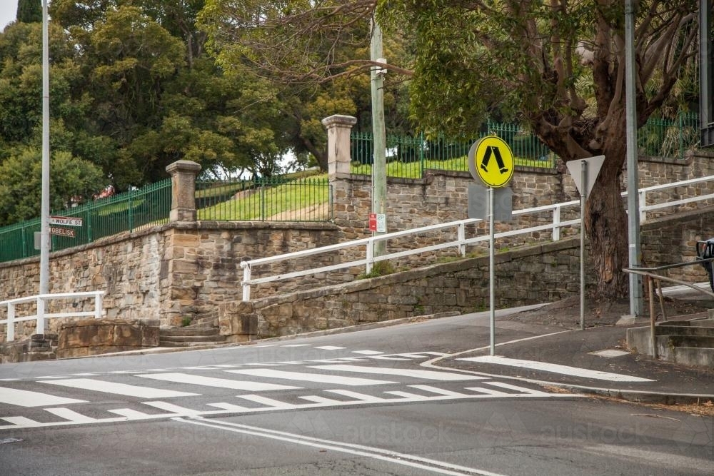 Empty pedestrian zebra crossing on a road in Newcastle - Australian Stock Image