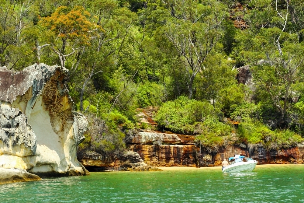 Enjoying summer from a boat at anchor in Refuge Bay. - Australian Stock Image