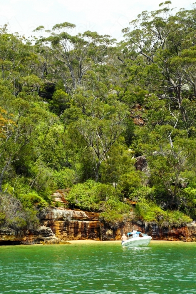 Enjoying summer from a boat at anchor in Refuge Bay. - Australian Stock Image