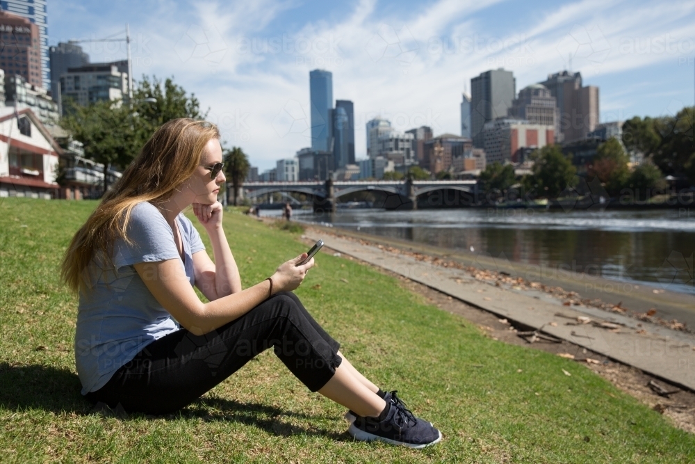 Enjoying the Sun Next to the Yarra River - Australian Stock Image