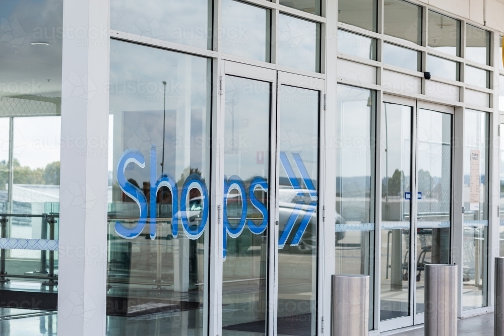 Automatic Doors Signshop Image of Entrance to shopping mall with sign to shops and glass windows ...