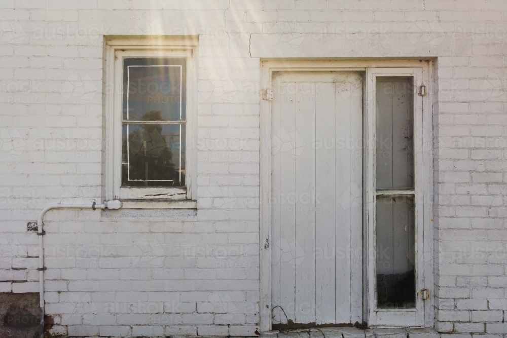Entrance to white brick home - Australian Stock Image