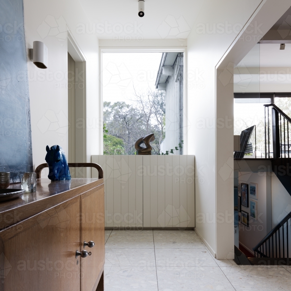 Entry foyer in designer mid century modern home interior - Australian Stock Image