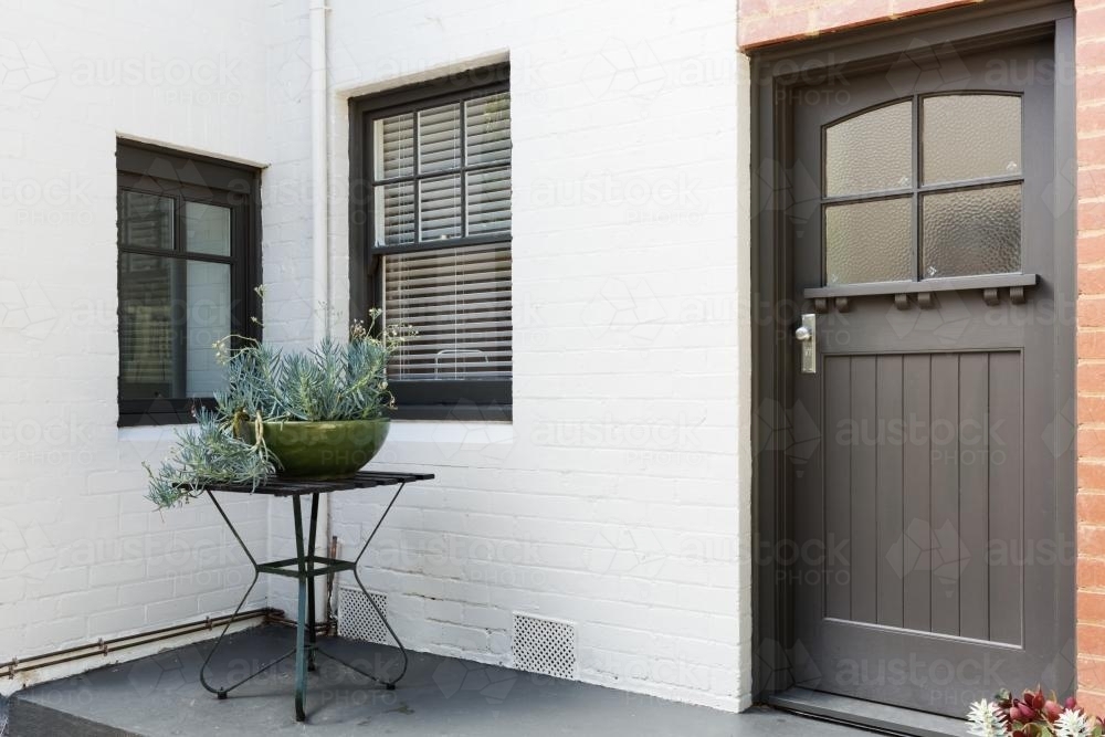 Entry porch and front door of an art deco style apartment - Australian Stock Image