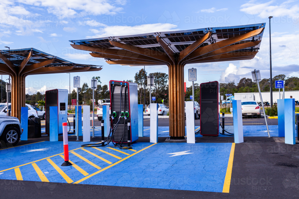 Image of Environmentally friendly electric vehicle charging stations ...