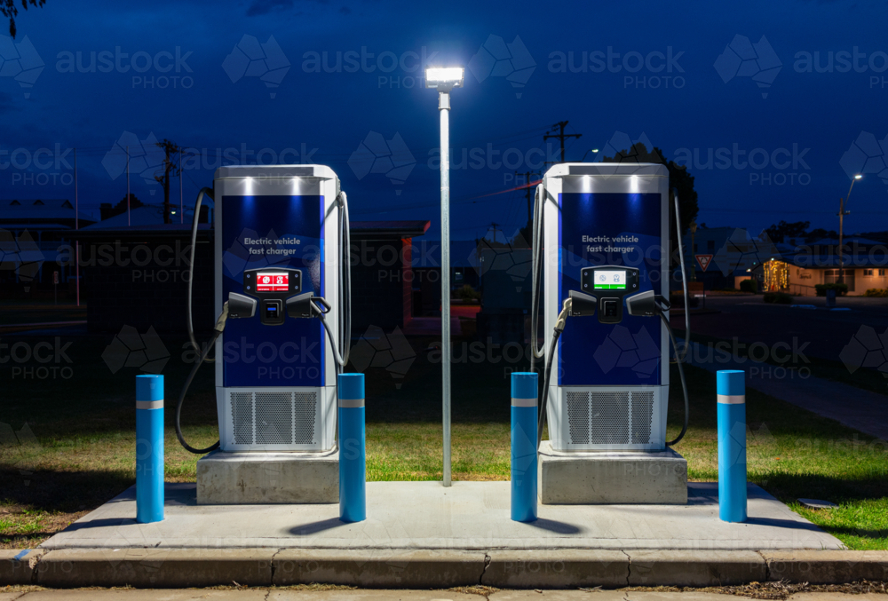 EV car chargers at night in Inverell, New South Wales - Australian Stock Image
