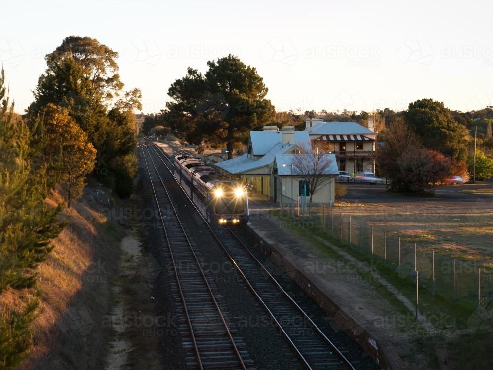 Evening rural train stopped at a railway station - Australian Stock Image