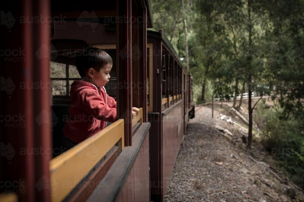 Excited 2 year old mixed race boy rides the Walhalla historic train - Australian Stock Image