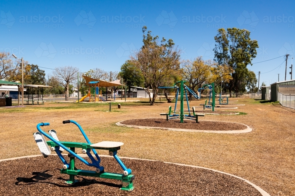 Exercise equipment in a park. - Australian Stock Image