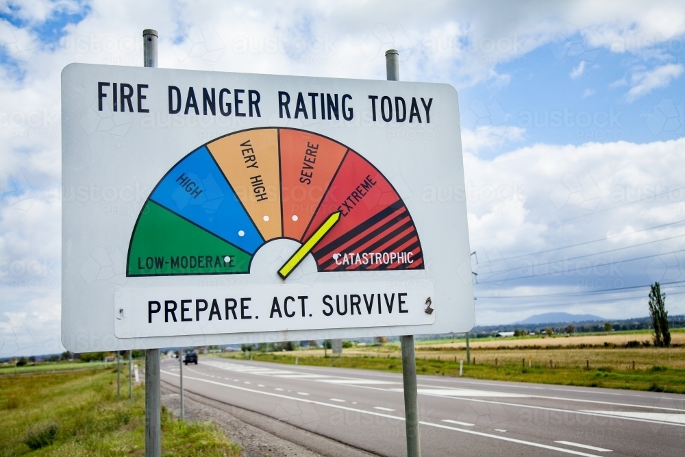 Extreme fire danger rating on sign beside Australian highway - Australian Stock Image
