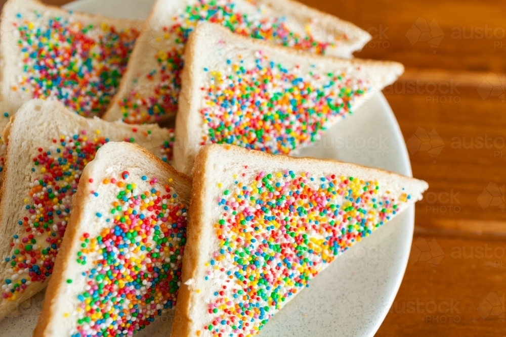 Fairy bread party food on wooden table - Australian Stock Image