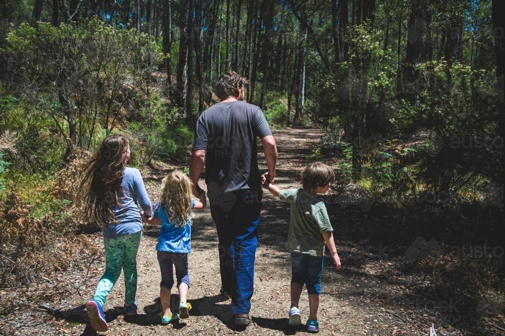 Family exploring a bush trail - Australian Stock Image