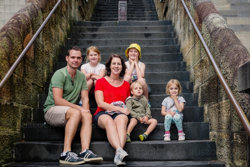 family portrait on stairs - Australian Stock Image