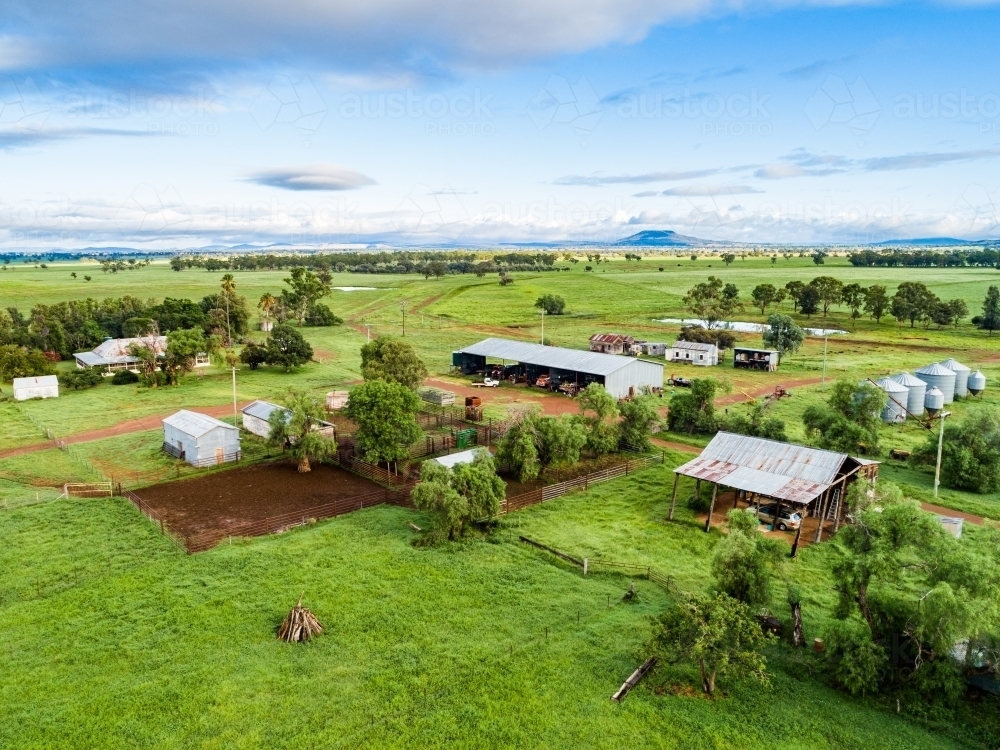 Farm buildings and stockyard seen from above on overcast day - Australian Stock Image