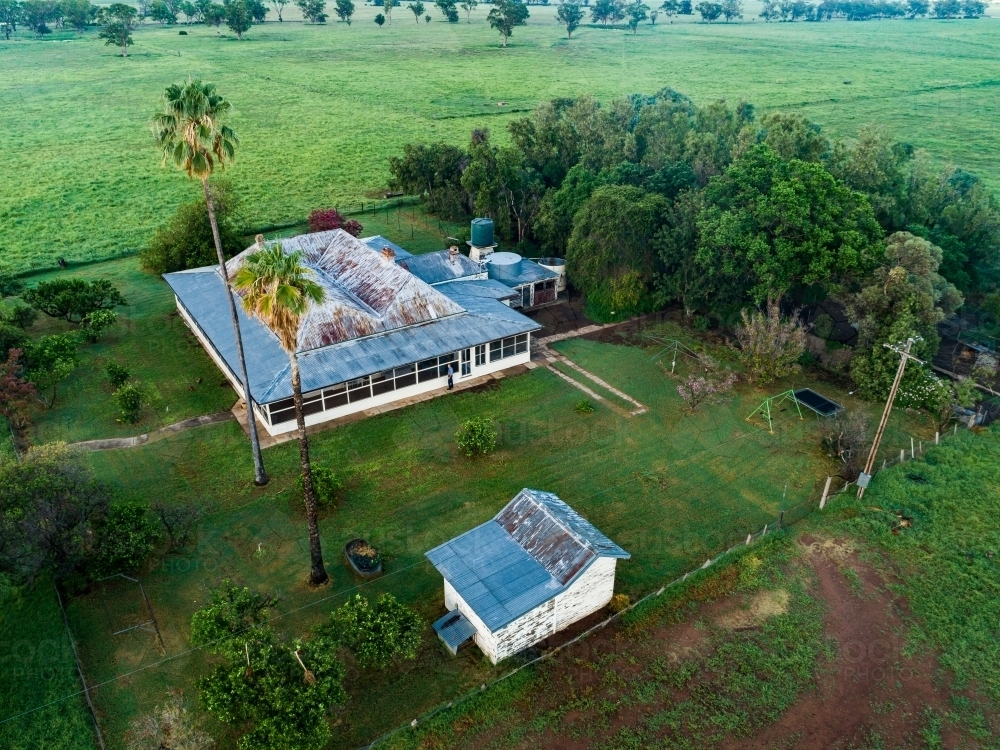 Image of Farm homestead among green paddocks Austockphoto