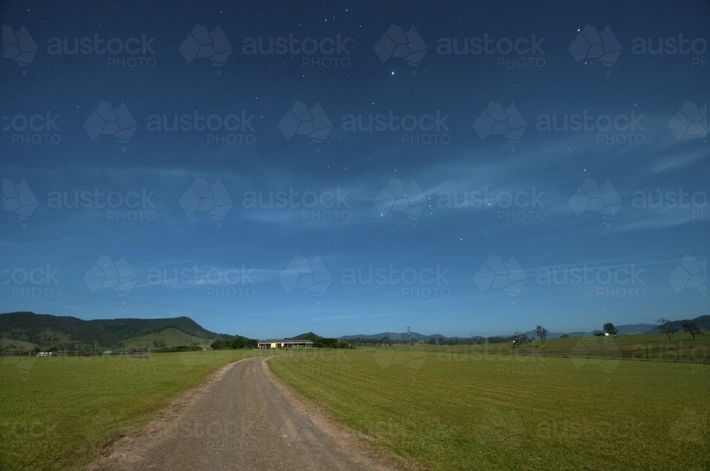 Farm land at night with some stars in the sky - Australian Stock Image