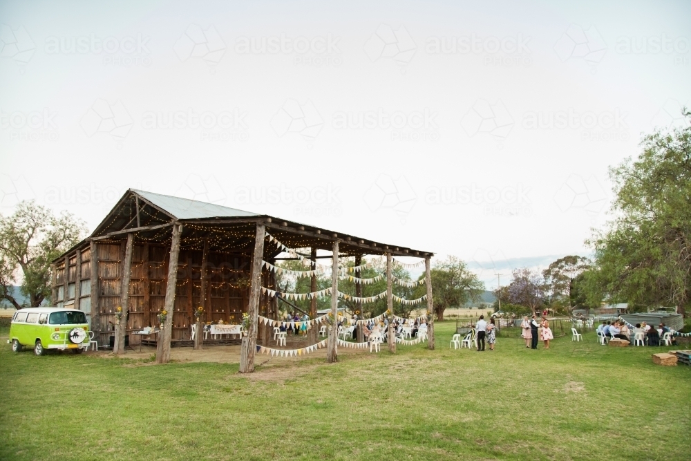 Farm sheds decorated with bunting for country wedding - Australian Stock Image
