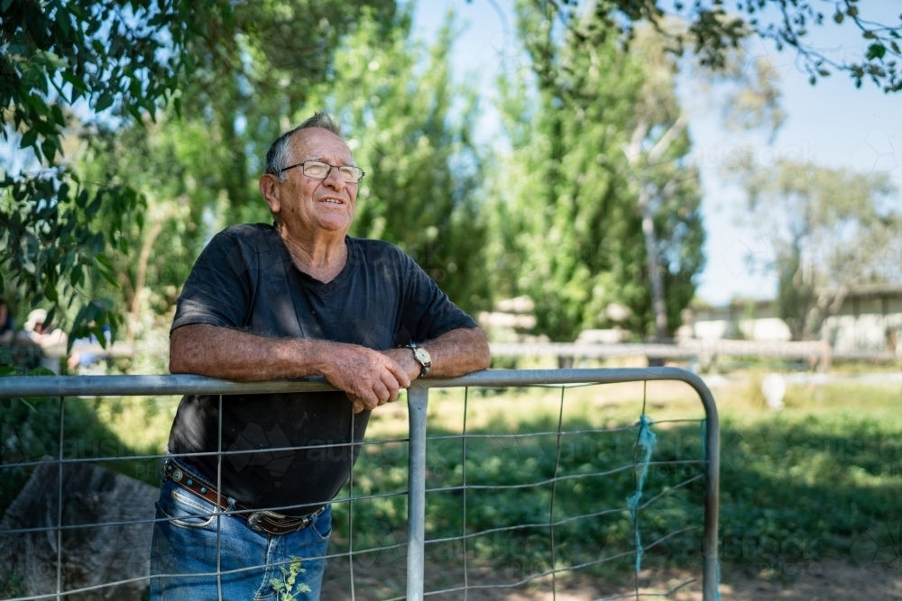Farmer Leaning on Gate - Australian Stock Image