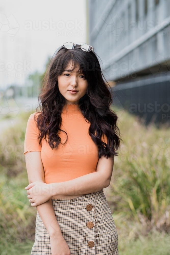 fashionable young woman in the street - Australian Stock Image