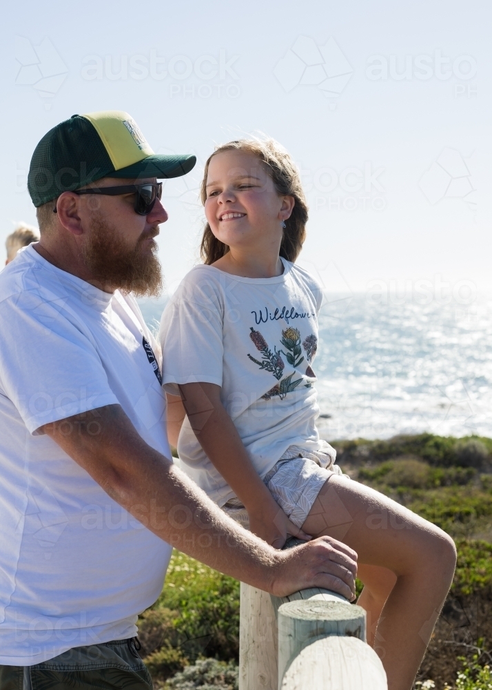 Father and daughter by the ocean - Australian Stock Image