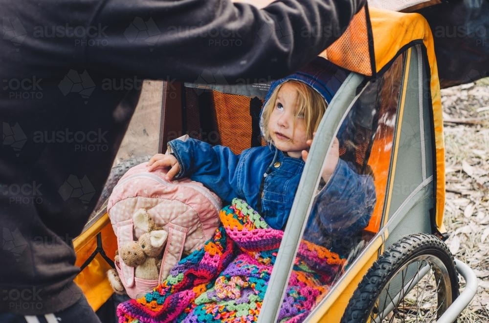 Father and daughter getting ready to ride a bike - Australian Stock Image