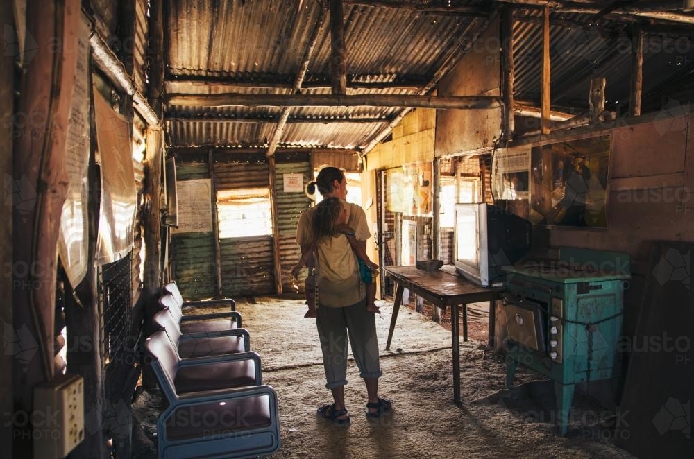 Father and Daughter in abandoned house - Australian Stock Image