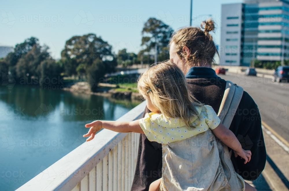 Father and daughter in city - Australian Stock Image