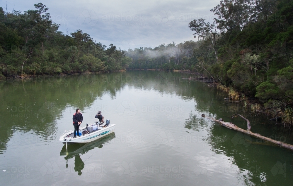 Father and Son Bream Fishing on a Gippsland River - Australian Stock Image